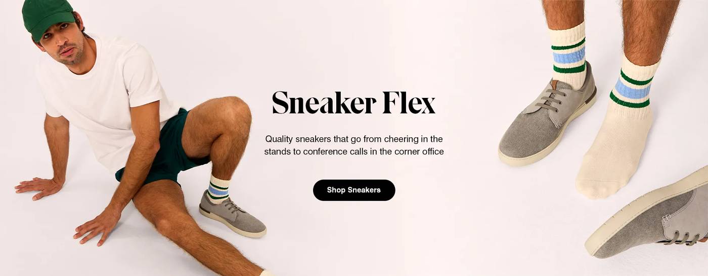 A man in the Bear sneaker in Light Grey suede and fabric styled with a striped crew sock