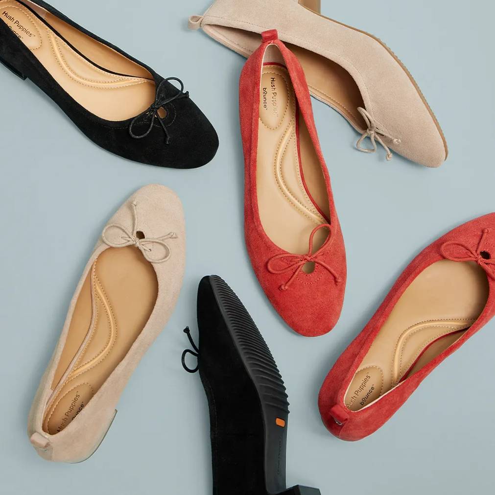 A spread of the Netty block-heel pumps in Cranberry red, Black, and Hint taupe suede.